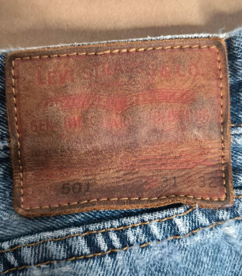 Levi 501"s, button  fly, leather tab W31