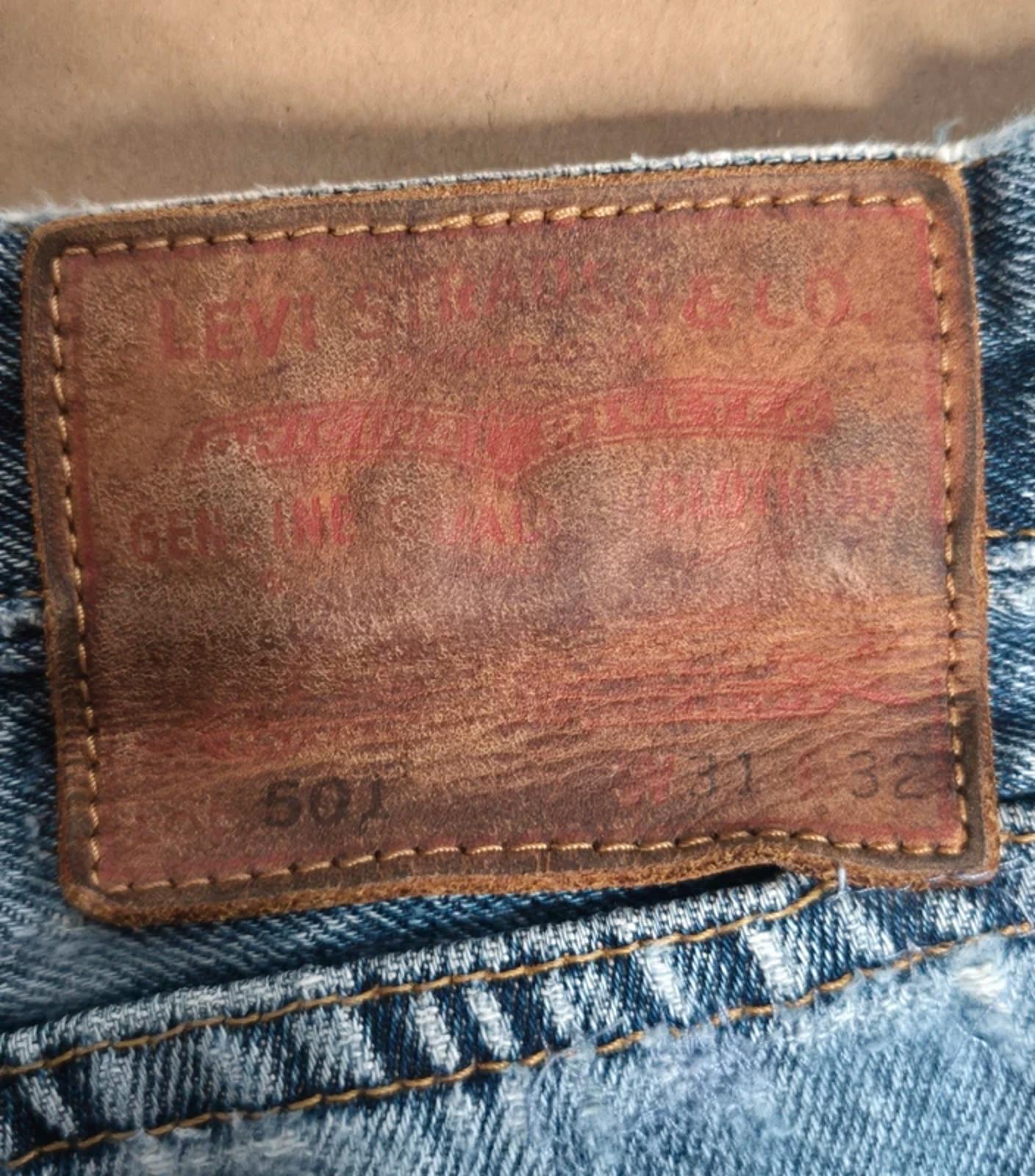 Levi 501"s, button  fly, leather tab W31