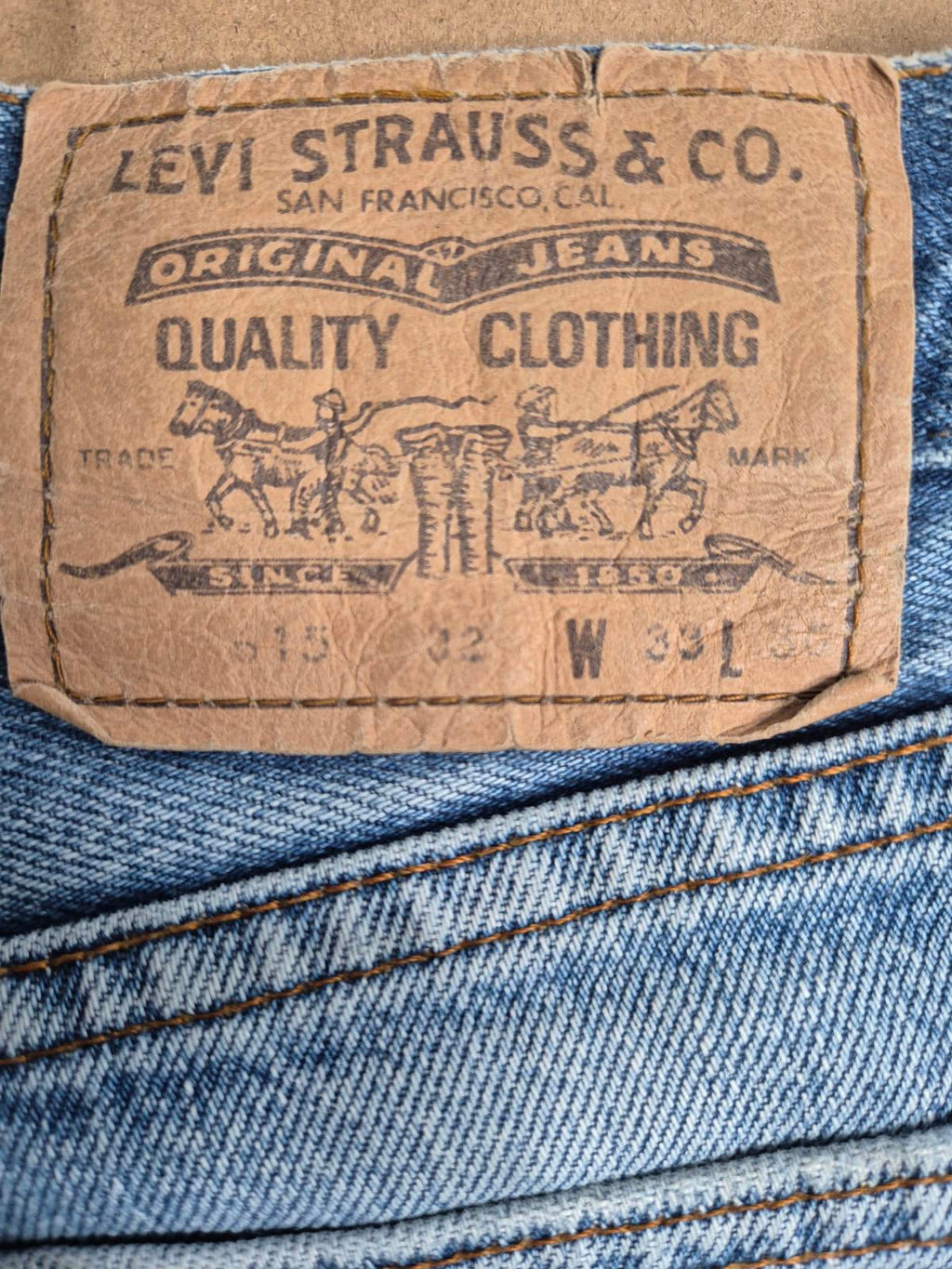 90s Levi 615s,orange tab, W32