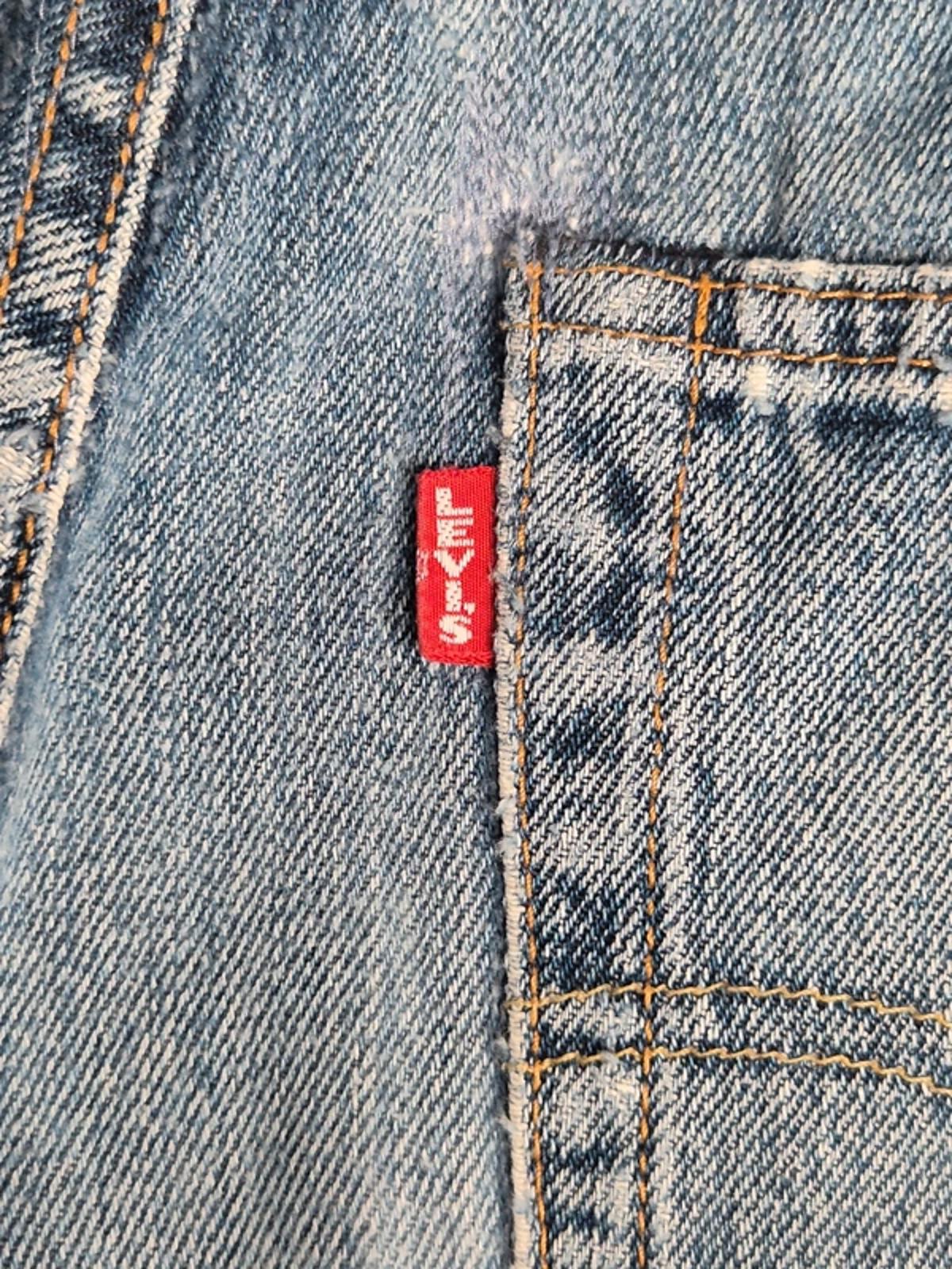 Levi 501"s, button  fly, leather tab W31